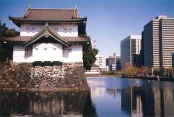 Palace grounds against modern buildings
